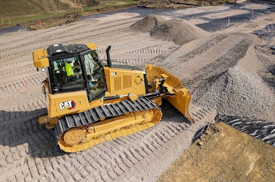 Cat D4 Dozer pushing aggregate