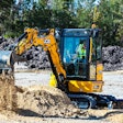 JCB 35X1 mini excavator dumping dirt