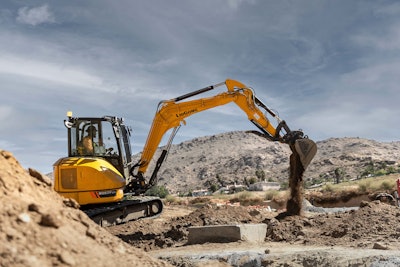 LiuGong 9057FZTS mini excavator dumping dirt