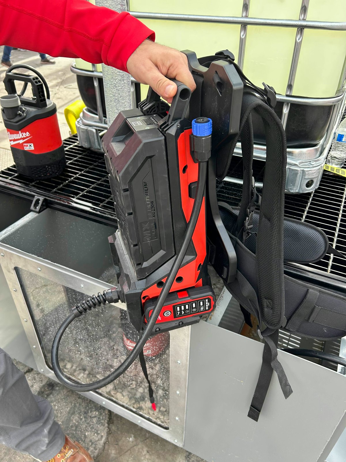 Milwaukee battery backpack discount