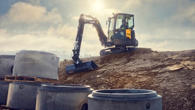 Volvo ECR40 mini excavator on dirt hill