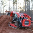 manitou 2300 vt compact track loader scooping dirt