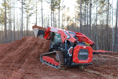 manitou 2300 vt compact track loader scooping dirt