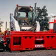 Crafco EZ Patcher attached to Bobcat skid steer