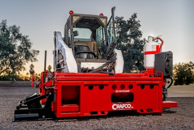 Crafco EZ Patcher attached to Bobcat skid steer