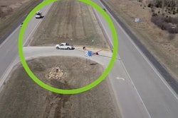 aerial view of pickup truck in middle of J-turn 4 lane divided highway Minnesota
