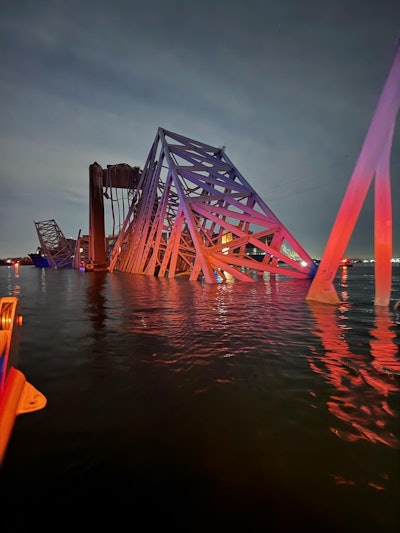 steel trusses stick out of water after baltimore bridge collapse