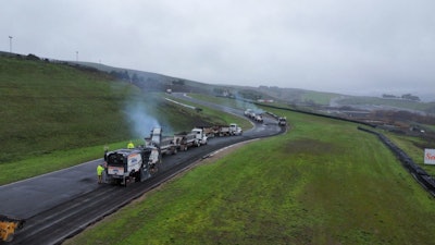 milling machines dump trucks milling up asphalt on Sonoma Raceway repave project