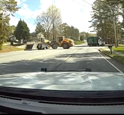 gwinnet police dash cam video of volvo wheel loader pushing side of volvo wheel loader in police chase