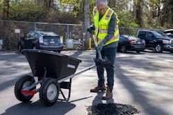 Microsoft co-founder Bill Gates fills a pothole with shovel and wheelbarrow with Modern Hydrogen asphalt