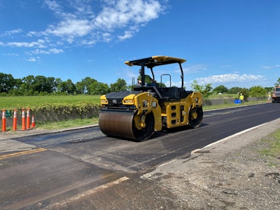 Cat mid-sized asphalt compactor on the job