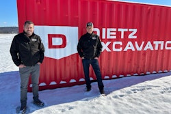 tony and bob dietz of bob dietz & sons in front of dietz excavation trailer