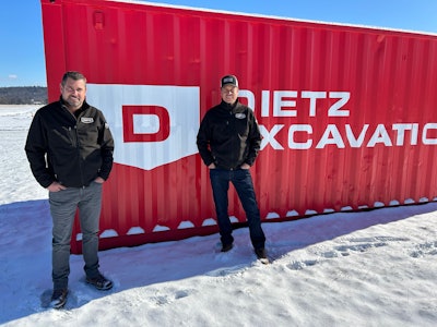 tony and bob dietz of bob dietz & sons in front of dietz excavation trailer