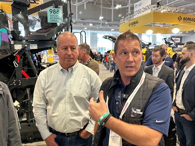 Dr. Vince Hafeli and Jamie Roush, president and general manager of Dynapac