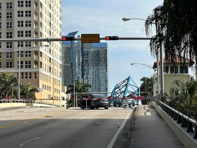 Section of a collapsed crane on a Fort Lauderdale bridge