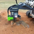 Loftness 24SG Stump Ax stump grinder attachment on a CTL