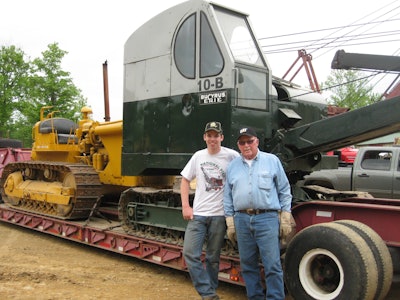 Sam Descutner grandfather Lou McMaster in front of Bucyrus Erie 10-B cable shovel