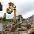 Menzi Muck excavator autonomously building a retaining wall