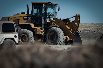 Cat wheel loader parked on a construction site