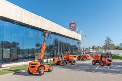 Ausa headquarters building with equipment parked outside