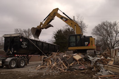 Alan's Excavating excavator and dump truck