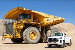 Komatsu mining truck with a Toyota pickup