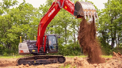 Link-Belt 220 X4S excavator dumping dirt