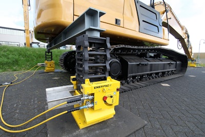 Enerpac cube jacks lifting an excavator