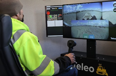 Equipment operator uses a Teleo command center to run equipment remotely