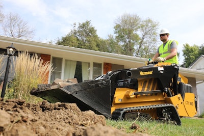 worker on Vermeer CTX160 mini track loader