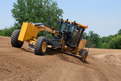 Deere 772GP SmartGrade Motor Grader grading on dirt slope