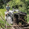 Bobcat MT100 mini track loader with a grapple attachment