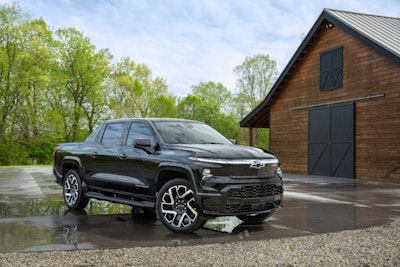 2024 silverado ev rst parked outside barn