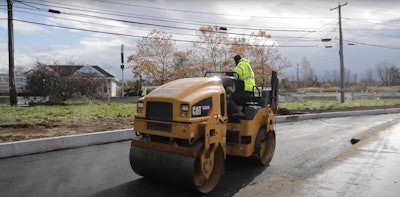 AM Equipment operator on a Cat Roller