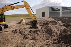 Cat Grading Beam attachment on an excavator