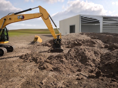 Cat Grading Beam attachment on an excavator