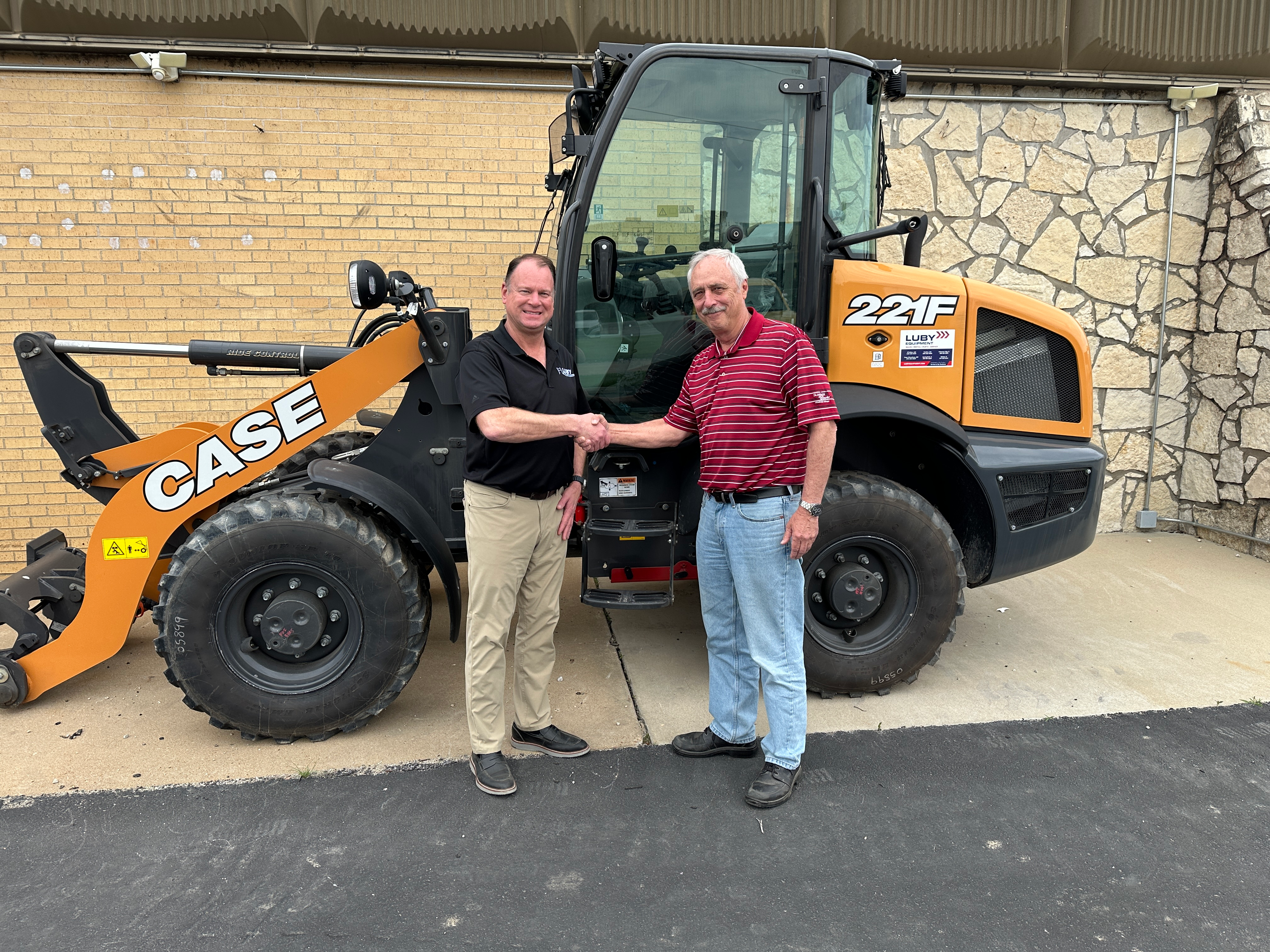 Steve Luby, president of Luby Equipment (left) and Jim Richiert, dealer principal of Potter Equipment
