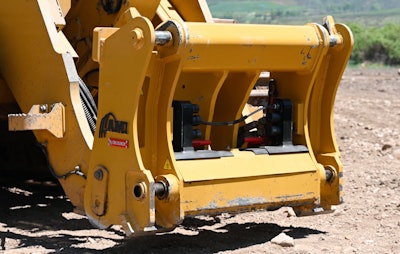 quick attach coupler for track loader