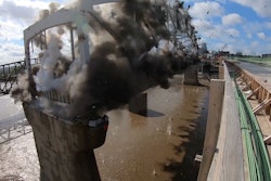 explosion of last arch of Buck O'Neil Bridge Kansas City