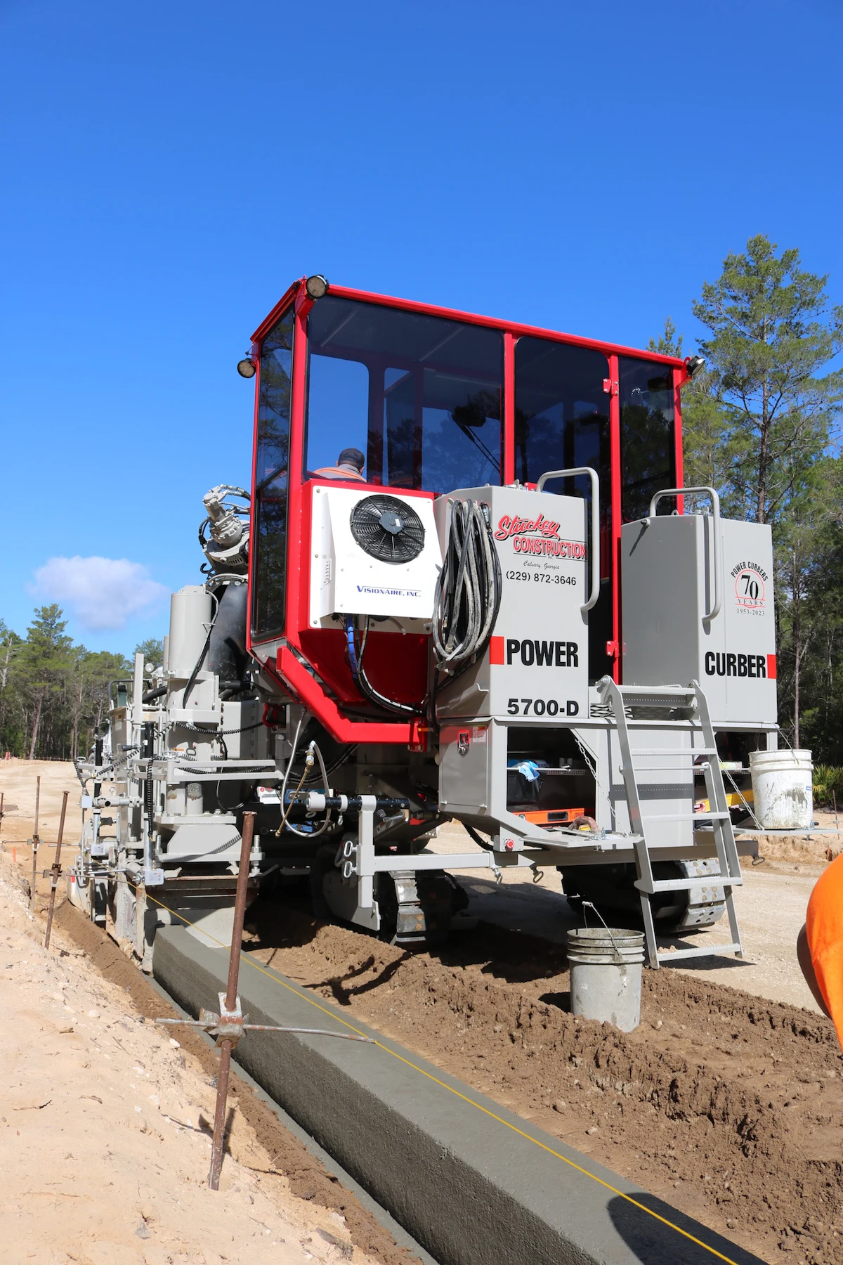 Power Box Paver Power Curbers now offers cab for 5700-D curb & gutter paver | Equipment ...