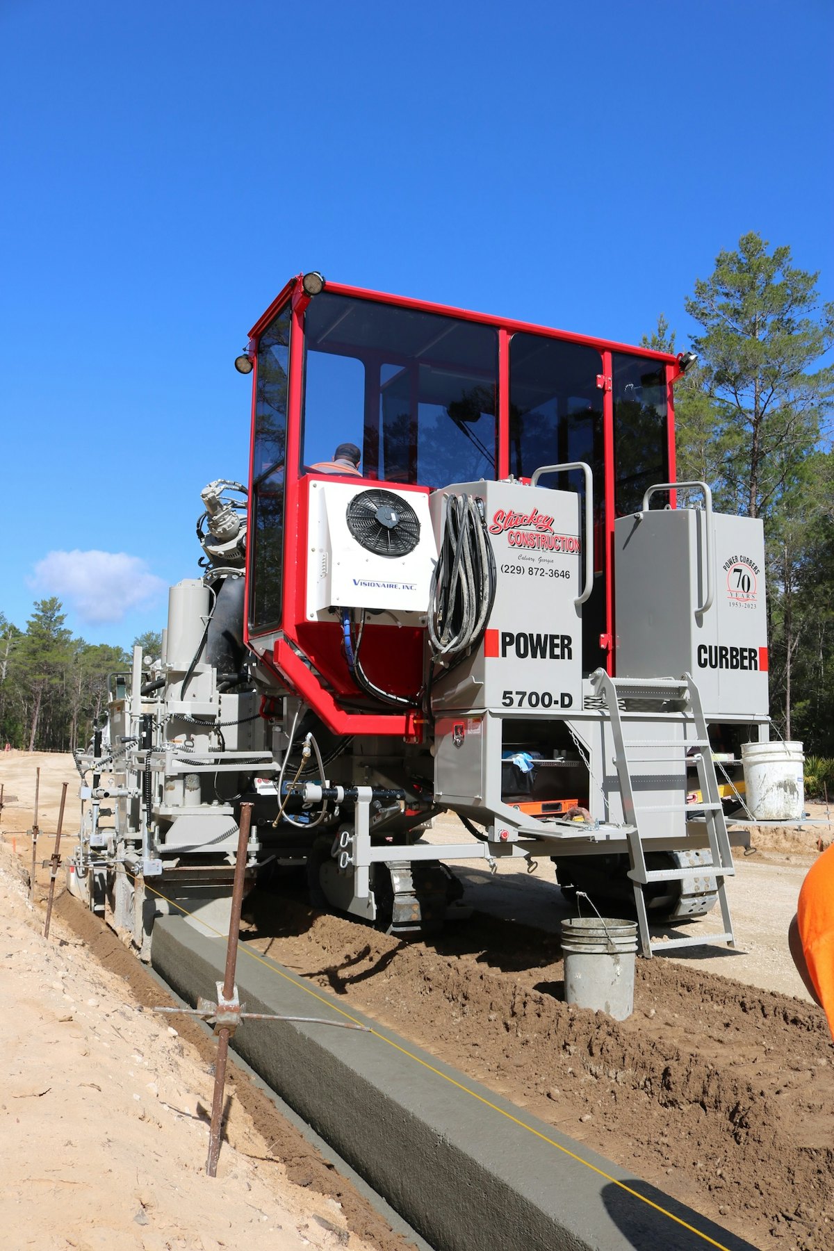 Power Curbers Launches the First HVAC Cab for a Curb & Gutter Paver