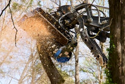 Blue Diamond Attachments Excavator Drum Mulcher shredding tree