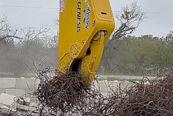 Genesis GRP 480 rebar processor on excavator grabbing bundle of twisted rebar