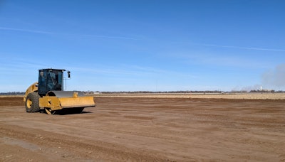 cat roller on dirt field