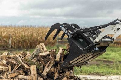 ignite bucket grapple on bobcat mini track loaders reaching for logs