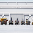 a lineup of volvo construction equipment