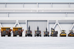 a lineup of volvo construction equipment