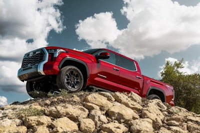 red 2025 Toyota Tundra Limited on rock mound