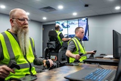 Three operator trainees work together in Cat Simulators Collaborative Worksite Training