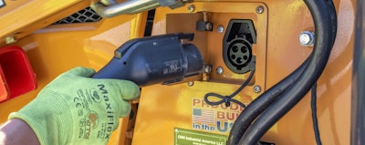 Case 580EV electric backhoe charging plug